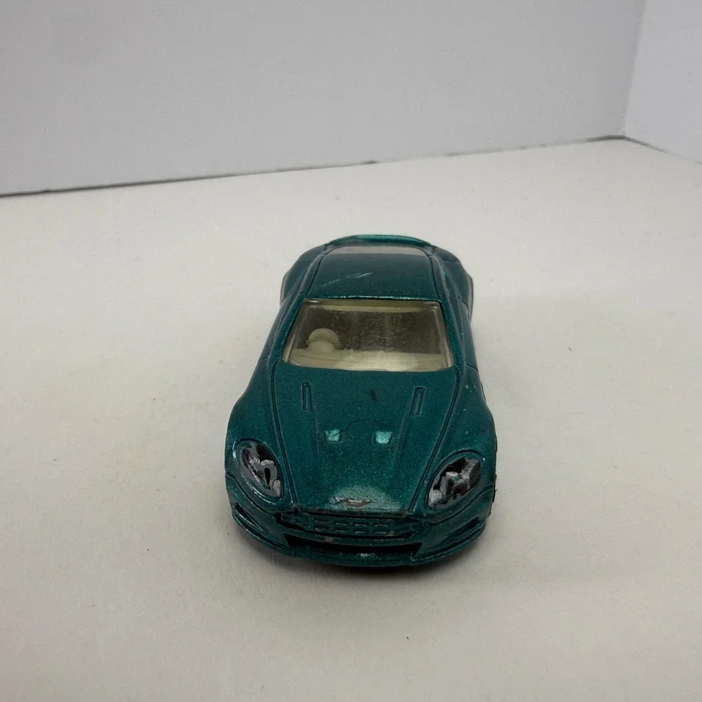 Hot Wheels Aston Martin DBS Metallic Teal 2010 All Stars 1/64 Diecast Car R6459